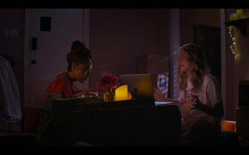 Apple MacBook Laptop of Lili Reinhart as Natalie and Tito’s Tacos Drink Cup in Look Both Ways (2022)