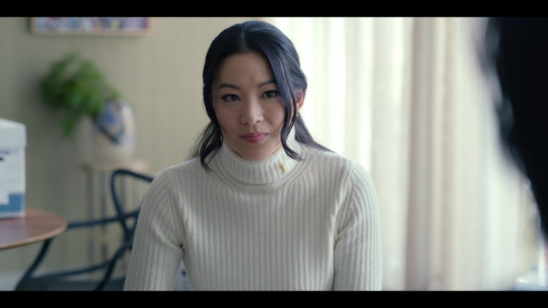 Saint Laurent White Turtleneck Sweater Worn by Arden Cho as Ingrid Yun in Partner Track S01E10 Dawn Raid (2022)