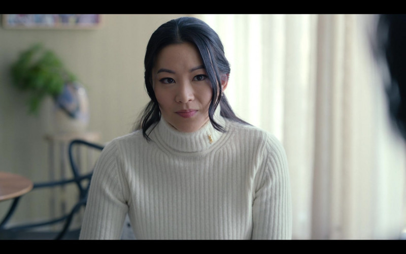 Saint Laurent White Turtleneck Sweater Worn by Arden Cho as Ingrid Yun in Partner Track S01E10 Dawn Raid (2022)