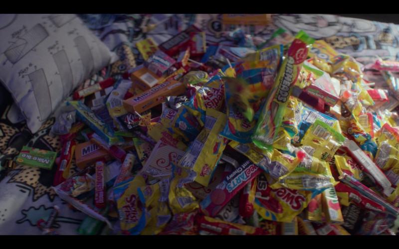 Mike and Ike, Milk Duds, Starburst, Swedish Fish, Hershey's, Airheads Candy, SweeTARTS, Sugar Daddy (candy), Sour Punch, Dove Chocolate, Kit Kat in The Mighty Ducks: Game Changers S02E03 "Coach Classic" (2022)