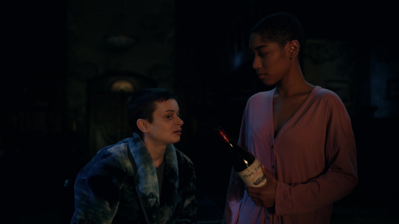 Muga Prado Enea Gran Reserva Wine Bottle Held by Iman Benson as Ilonka in The Midnight Club S01E01 The Final Chapter (2022)