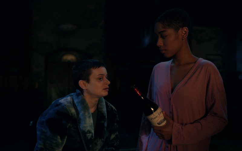 Muga Prado Enea Gran Reserva Wine Bottle Held by Iman Benson as Ilonka in The Midnight Club S01E01 The Final Chapter (2022)