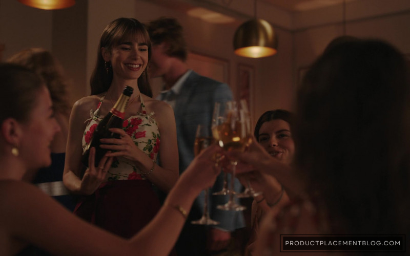 Piper Heidsieck Cuvee Brut Champagne Bottle Held by Lily Collins as Emily Cooper in Emily in Paris S03E04 Live from Paris,