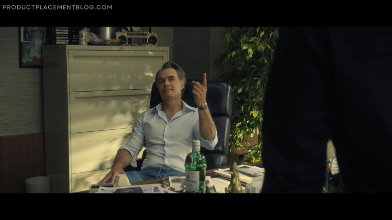 Tanqueray Gin Bottle of Murray Bartlett as Nick De Noia in Welcome to Chippendales S01E07 Paper Is Paper (2022)