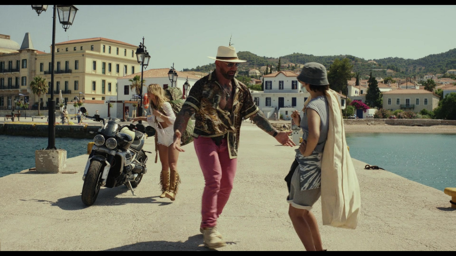 Triumph Motorcycle Of Dave Bautista As Duke Cody & Madelyn Cline As Whiskey In Glass Onion A