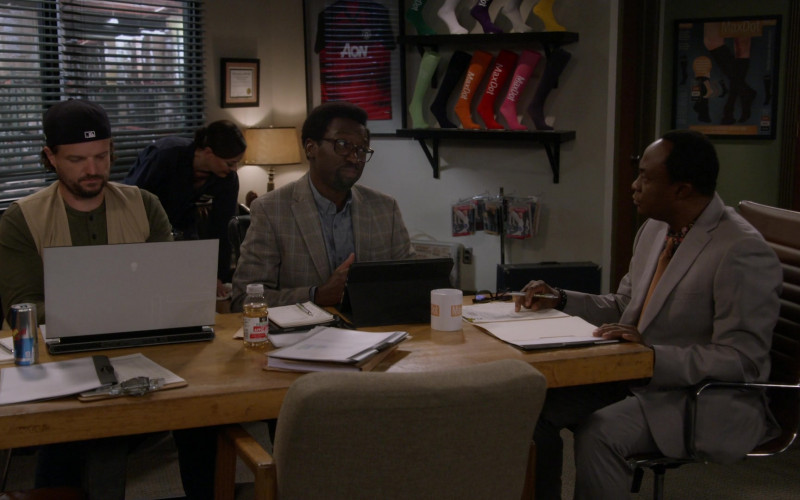 Alienware Laptop and AON T-Shirt in Bob Hearts Abishola S04E10 An Afro and a Peugeot (2023)