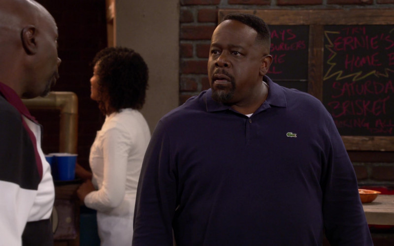 Lacoste Men’s Shirt Worn by Cedric the Entertainer in The Neighborhood S05E11 Welcome to the Cornhole (2023)