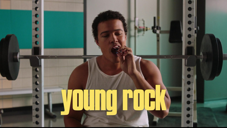 Snickers Chocolate Bar Enjoyed by Uli Latukefu in Young Rock S03E09 It All Goes Back to Childhood (2023)