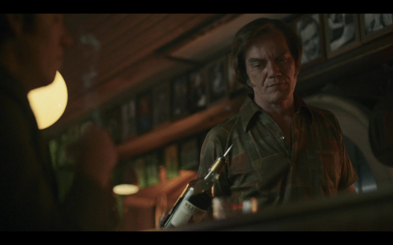 Wild Turkey Kentucky Bourbon Whiskey Bottle Held by Michael Shannon in George & Tammy S01E06 "Justified & Ancient" (2023)