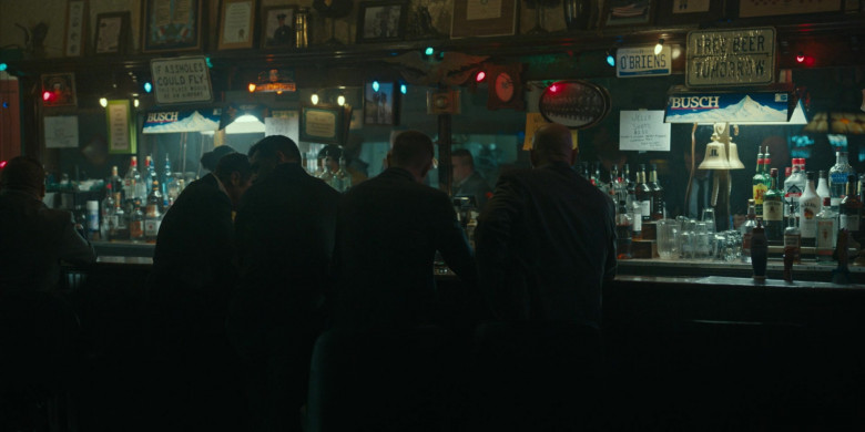Busch Beer Signs, J&B Scotch Whisky, Malibu Rum, Absolut Vodka, Beefeater Gin in Mayor of Kingstown S02E07 Drones (2023)