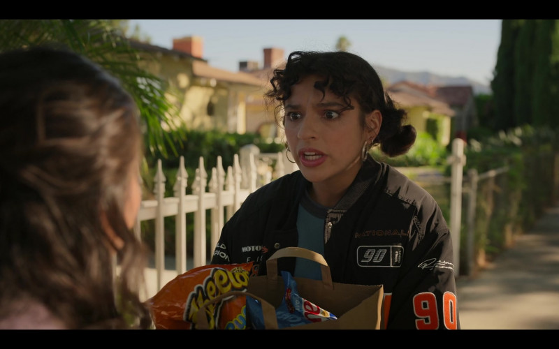 Cheetos Puffs Snacks Held by Bryana Salaz as Ines in Freeridge S01E08 Thanksgiving (3)