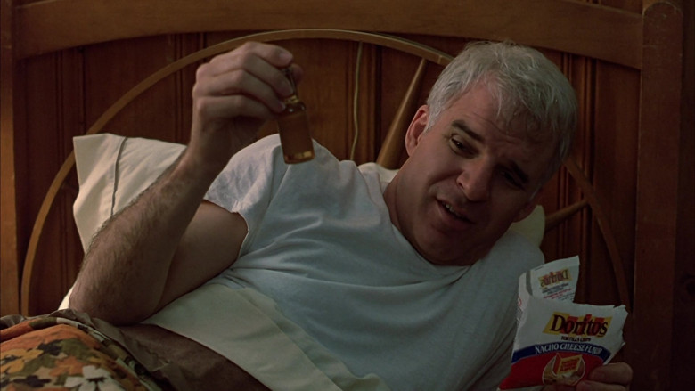 Doritos Nacho Cheese Chips of Steve Martin as Neal Page in Planes, Trains and Automobiles (1987)