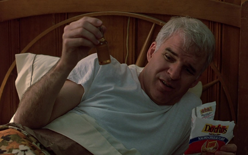 Doritos Nacho Cheese Chips of Steve Martin as Neal Page in Planes, Trains and Automobiles (1987)