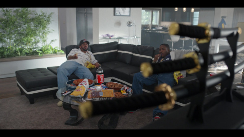 Lay's Chips, Ruffles, Rold Gold Pretzels, Coca-Cola Bottle, Hershey's Mr.Goodbar Chocolate Bar, Snickers, Tostitos in Wu-Tang An American Saga S03E02 All I Need (2023)