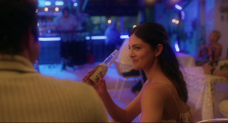 Pacifico Beer of Monica Barbaro as Sophie Wilder in At Midnight 2023 Movie (2)