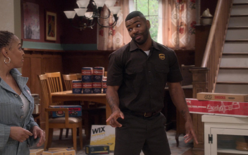 UPS Uniform Worn by Jermelle Simon as Bernard Upshaw Jr. and WIX Filters in The Upshaws S03E02 "Home Repairs" (2023)