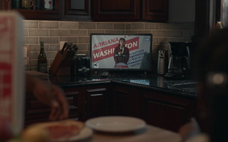 A to Z Wine Bottle and LG TV in Dear Edward S01E08 "Music" (2023)