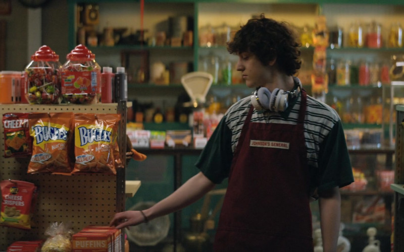 Cheez-It Crackers, RITZ Cheese Crispers Cheddar Chips, Bugles Nacho Cheese Flavor Crunchy Corn Chips in The Big Door Prize S01E03 Jacob (2023)