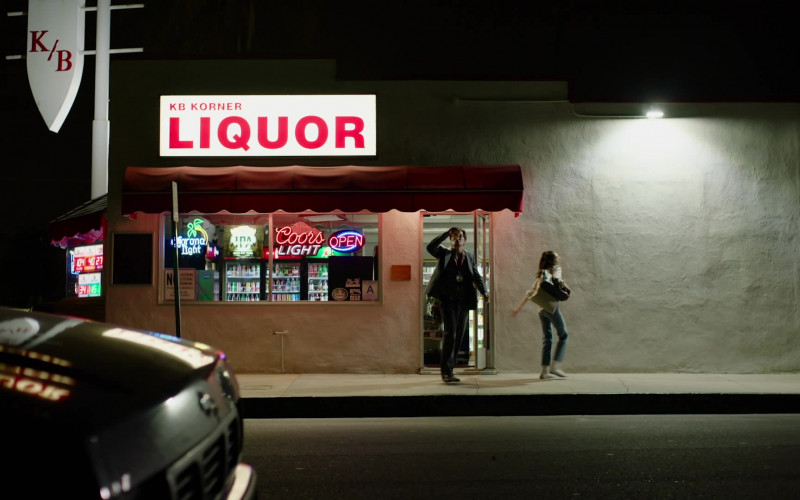 Corona Light and Coors Light Beer Neon Signs in A Little White Lie (2023)