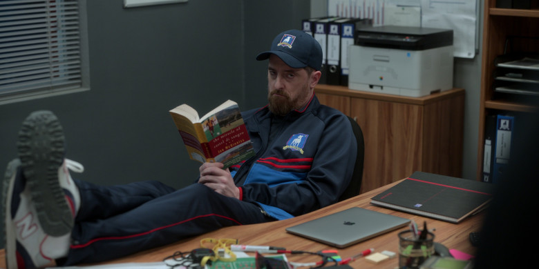 New Balance 515 Sneakers and Apple MacBook Laptop of Brendan Hunt as Coach Beard in Ted Lasso S03E01 Smells Like Mean Spirit (2023)