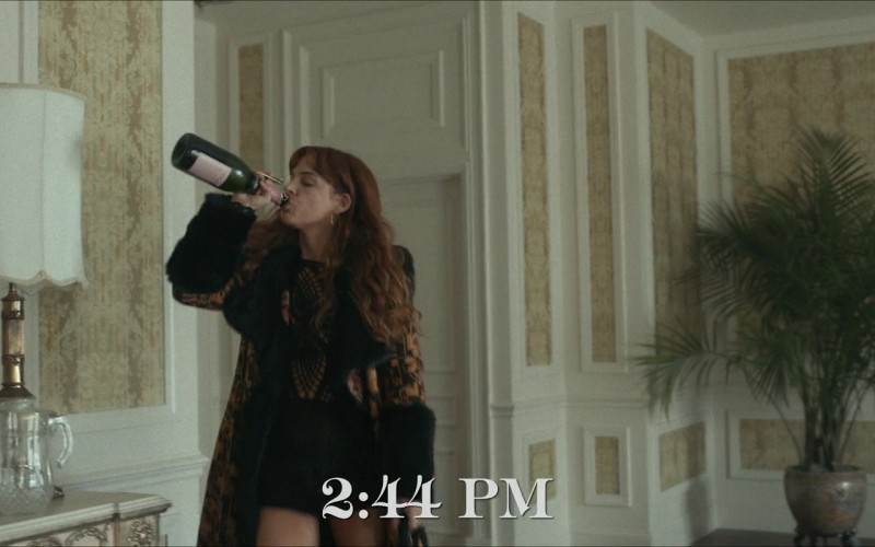 Smirnoff Vodka Bottle in Daisy Jones & The Six S01E10 "Track 10: Rock 'n' Roll Suicide" (2023)