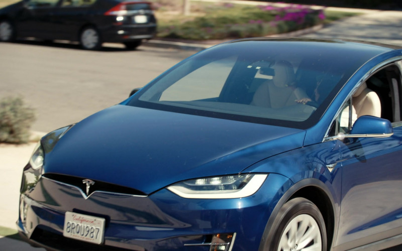 Tesla Blue Car in Every Breath She Takes (2023)