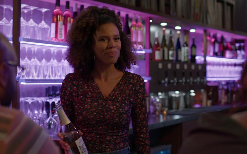 McBride Sisters Black Girl Magic Wine Bottle Held by Actress in Grand Crew S02E07 Wine & Honors (1)