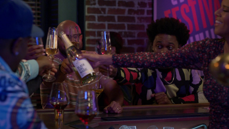 McBride Sisters Black Girl Magic Wine Bottle Held by Actress in Grand Crew S02E07 Wine & Honors (2)