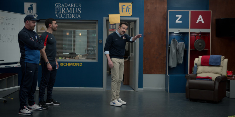 Nike Air Zoom Sneakers of Jason Sudeikis, New Balance Shoes of Brendan Hunt as Coach Beard, Nike Black Sneakers and Clothes of Brett Goldstein as Roy Kent in Ted Lasso S03E05 Signs (2)
