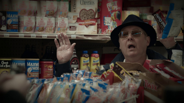 Maxwell House, Nissin Cup Noodles, General Mills Cheerios, Kellogg's Froot Loops, Peanut Chews, Chock full o'Nuts, Folgers, Hershey's Syrup, Nesquik, Twix, Twizzlers, Hostess in The Blacklist S10E11 "The Man in the Hat" (2023) - 368314