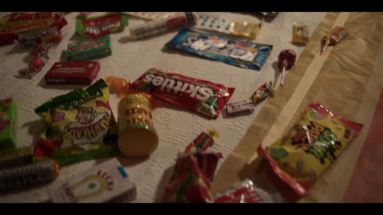 Starburst, Skittles, Warheads Candy, Reed's All Natural Peppermint Hard Candy, Sour Patch Kids, Razzles Gum Candies in Saint X S01E07 "The Goat Witch and the Sinner" (2023) - 375288