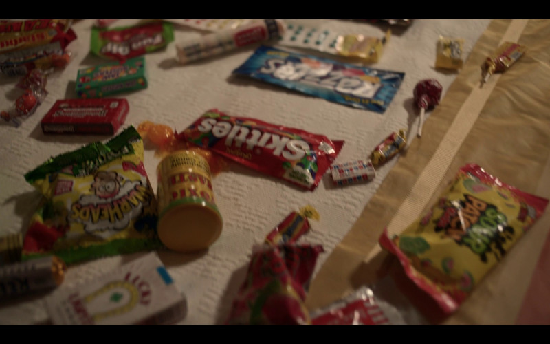 Starburst, Skittles, Warheads Candy, Reed's All Natural Peppermint Hard Candy, Sour Patch Kids, Razzles Gum Candies in Saint X S01E07 "The Goat Witch and the Sinner" (2023)