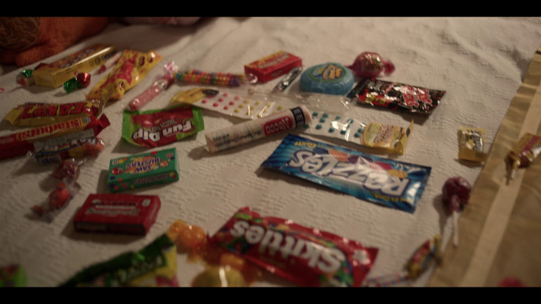Starburst, Skittles, Razzles Gum Candies, Fun Dip, Necco Wafers in Saint X S01E07 "The Goat Witch and the Sinner" (2023) - 375284