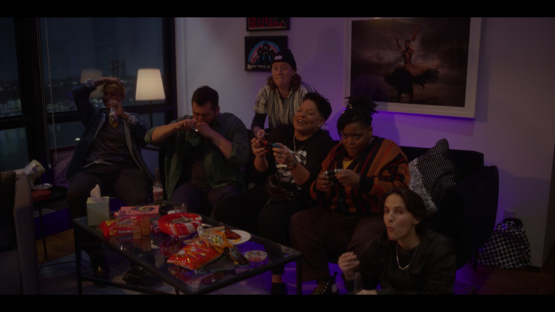UTZ Chips, Sol Beer, Nabisco Nutter Butter Peanut Butter Sandwich Cookies, Cheetos Puffs and Nintendo Switch Controllers in And Just Like That... S02E05 "Trick or Treat" (2023) - 383702