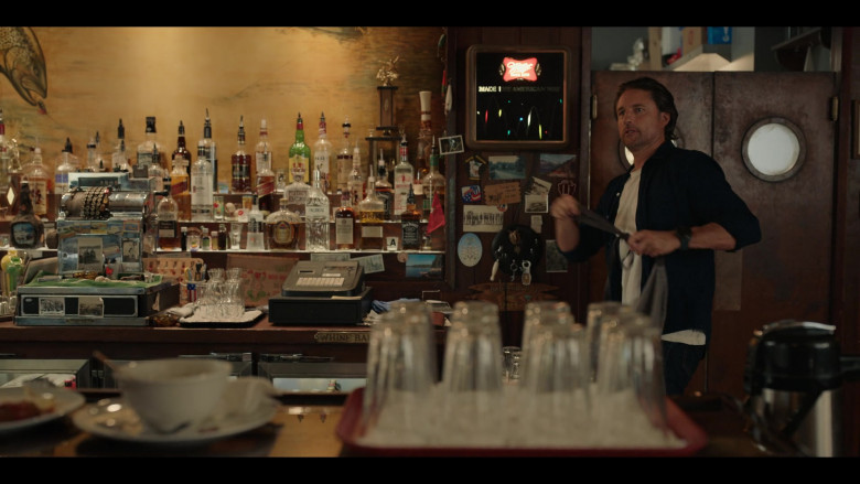 Captain Morgan Rum, Absolut Vodka, Jack Daniel's, Ketel One, J.P. Wiser's Whisky, Johnnie Walker, Russian Standard Vodka, Crown Royal, Paddy, Finlandia, Beefeater Gin, Canadian Club Whisky, Miller High Life Sign in Virgin River S05E03 "Calculated Risk" (2023) - 398738