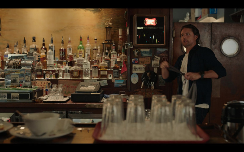 Captain Morgan Rum, Absolut Vodka, Jack Daniel's, Ketel One, J.P. Wiser's Whisky, Johnnie Walker, Russian Standard Vodka, Crown Royal, Paddy, Finlandia, Beefeater Gin, Canadian Club Whisky, Miller High Life Sign in Virgin River S05E03 "Calculated Risk" (2023)