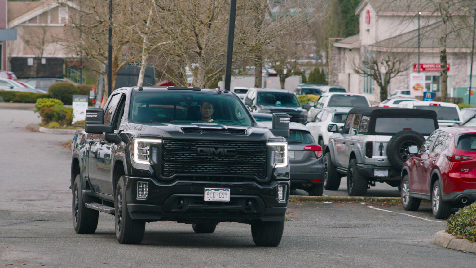 GMC Sierra 2500 Denali Black Pickup Truck In Tracker S01E02 "Springland