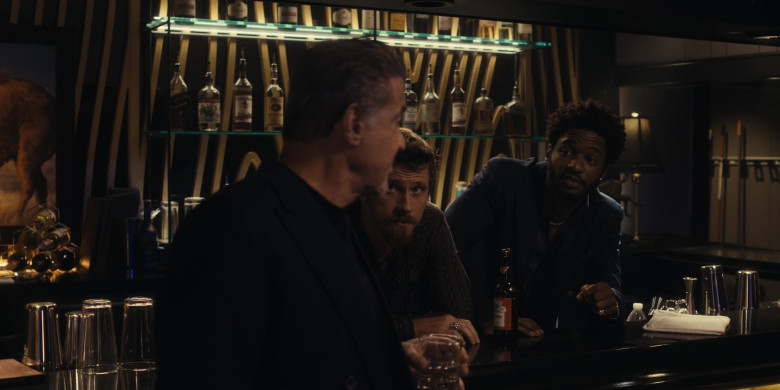 Johnnie Walker, Espolon Tequila, Captain Morgan Rum, Tito's Vodka, Tanqueray Gin, Casamigos, Budweiser in Tulsa King S02E08 "Under New Management" (2024) - 609460